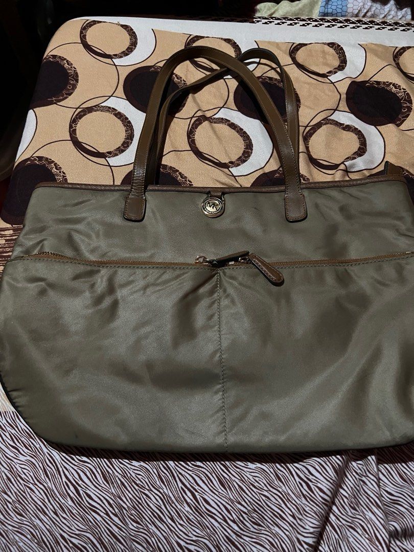 mk tote bag authentic (Category: Luxury Bags & Wallets) located in Makati City. Submitted by sinner_or_saint101 (Listing ID 1288239141, Image 2). Description: nylon mk bag light brown 11x16.
