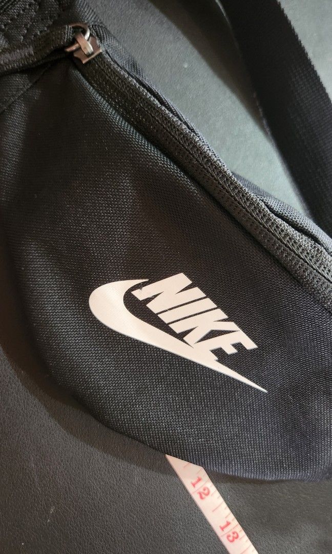 Nike Heritage Waistpack (3L) Unisex (Category: Belt bags, Clutches and Pouches) located in Quezon City. Submitted by allstopshop (Listing ID 1296805201, Image 2). Description: - Authentic - Used twice only Issue- scratched logo (see picture) https://www.nike.com/ph/t/heritage-waistpack-Fnc8kw/DB0490-010?_gl=1*1ns936n*_up*MQ..&gclid=CjwKCAjwwr6wBhBcEiwAfMEQs4Xj6VwX0UZazj6yVg-z9r_40g893apo3v02EyxO5zeuDIJFTAwZtBoCDi0QAvD_BwE&gclsrc=aw.ds.