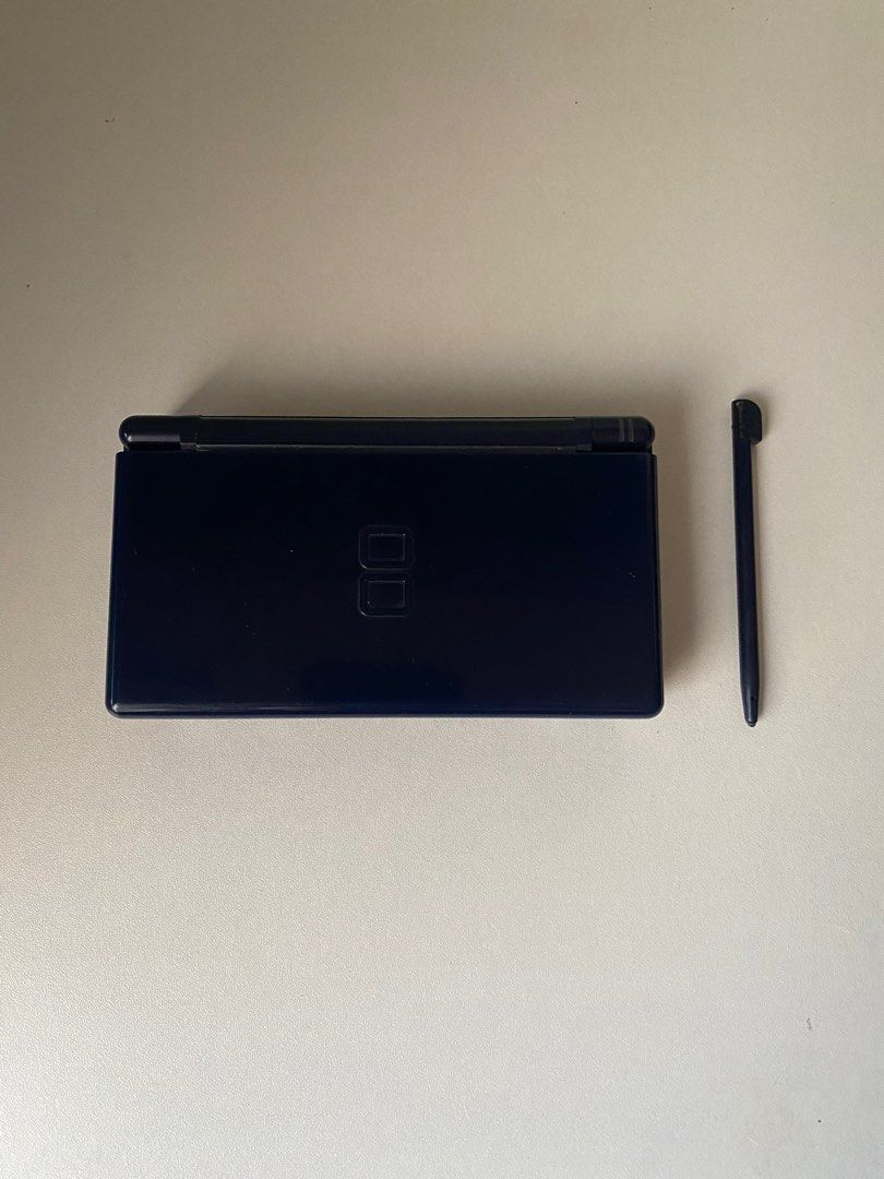 Nintendo DS lite defective unit (opened) (Category: Nintendo) located in Iloilo. Submitted by everythingarcade (Listing ID 1296832928, Image 1). Description: Unit is no longer working Good for parts only No other inclusions except for the stylus +sf J&T or LBC.