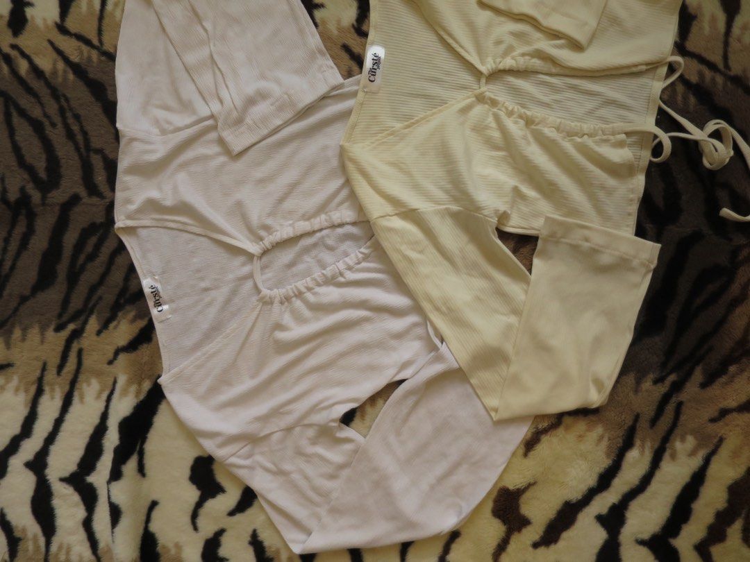 The Curste Project Cheryl Cotton Tie Top (Category: Longsleeves) located in Cebu City. Submitted by addtocarteu (Listing ID 1296872946, Image 3). Description: 🍋 never used, bought on tiktok shop 🍋 freesize (fits s-l frames since it is adjustable) 🍋 multipurpose, can be customized as a top or cardigan! available in white & cream buy both for only ₱200 each! 📍 Cebu City note — color may vary due to lighting. rest assured items are of decent con