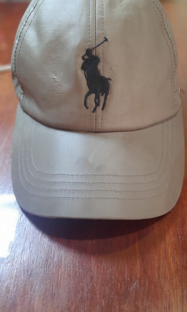 Brown cap high quality Made in Cambodia (Category: Hats & Beanies) located in San Juan City. Submitted by styleluxeonlineshop (Listing ID 1297063388, Image 3). Description: very lightweight no flaws, needs washing color light brown with big logo adjustable closure snap.