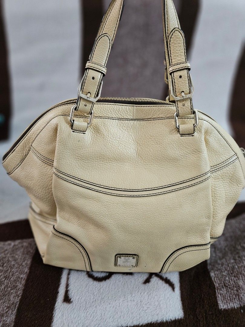 ORIGINAL MCM BAG (Category: Luxury Bags & Wallets) located in Rizal. Submitted by missytin (Listing ID 1296909190, Image 1). Description: Original AUTHENTIC MCM BAG with pen marks thus selling low. last price posted, will give discount for multiple purchase in single transaction. Shipping via LALAMOVE OR LBC only. Gcash payment..