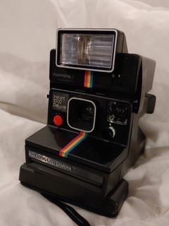 Polaroid Instant 1000 Deluxe SX-70 Camera with flash