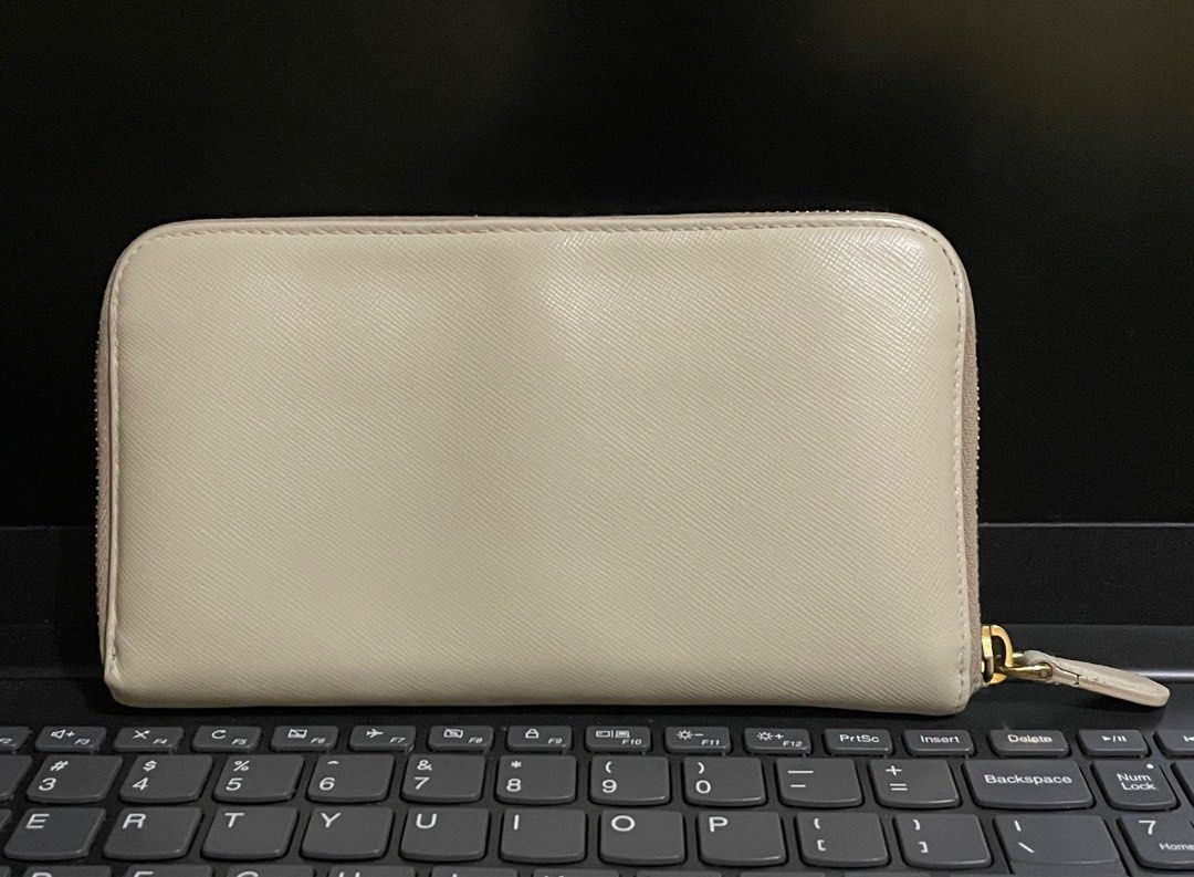 Prada Saffiano Wallet (Category: Luxury Bags & Wallets) located in Cavite. Submitted by HelloAnn_Closet (Listing ID 1296947271, Image 2). Description: Selling my Prada Saffiano wallet. Guaranteed authentic. RFS: already using WOC Very pretty in actual. Pictures will be sent upon request. .