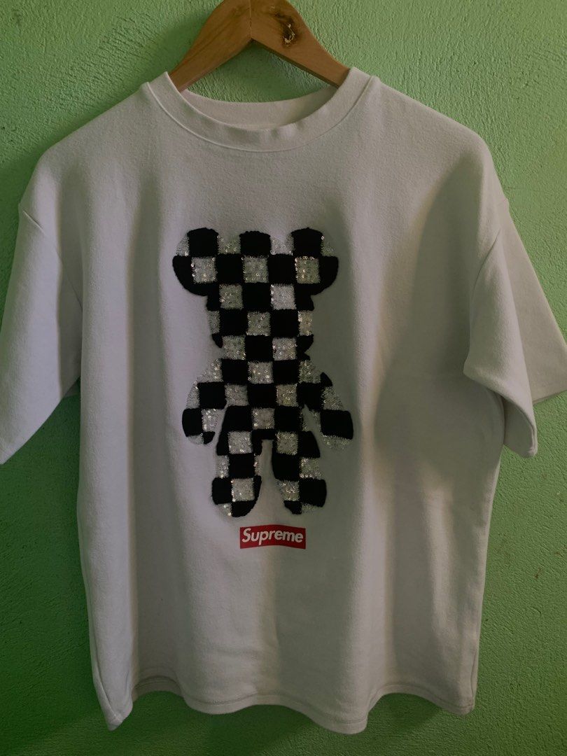 Supreme Gloomy Bear Tee (Category: Tshirts & Polo Shirts ) located in Cavite. Submitted by mcgars (Listing ID 1297032493, Image 1). Description: Good Condition 20x27 Heavy cotton Large fit Issue: Tiny stain at the back(not noticeable).