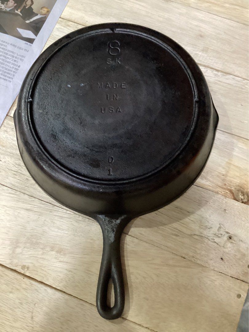 #8 Cast Iron Skillet (Category: Other Kitchenware & Tableware) located in Davao. Submitted by ferdipt (Listing ID 1297189947, Image 1). Description: Vintage #8 Lodge Cast Iron Skillet with a 3 notch heat ring. Condition: Used Stove Compatibility: Electric, Gas, Induction Made in USA.