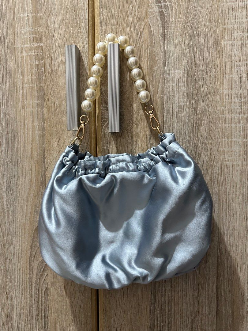 Blue Wedding Pouch (Category: Purses & Pouches) located in Manila. Submitted by eeceec (Listing ID 1297172491, Image 2). Description: Blue Wedding Pouch With pearl handle or gold chain Very cute and classy to use when wearing a bridesmaid gown..