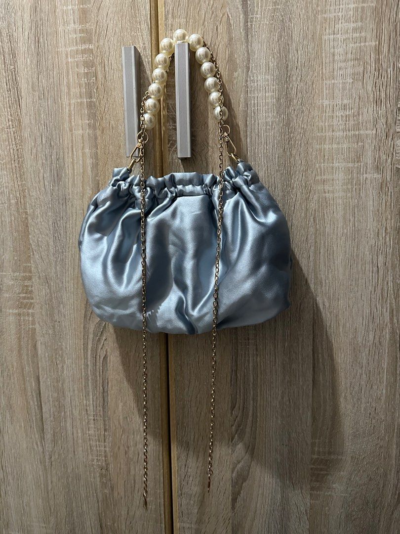 Blue Wedding Pouch (Category: Purses & Pouches) located in Manila. Submitted by eeceec (Listing ID 1297172491, Image 3). Description: Blue Wedding Pouch With pearl handle or gold chain Very cute and classy to use when wearing a bridesmaid gown..