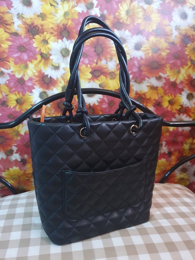 Chanel tote bag (Category: Luxury Bags & Wallets) located in Makati City. Submitted by britishheart (Listing ID 1297200198, Image 2). Description: selling my preloved chanel tote bag..japan source genuine leather almost same with orig but selling this low since no serial# and no certificate but it possessed its originality. like new since used only 2x..japan auction..