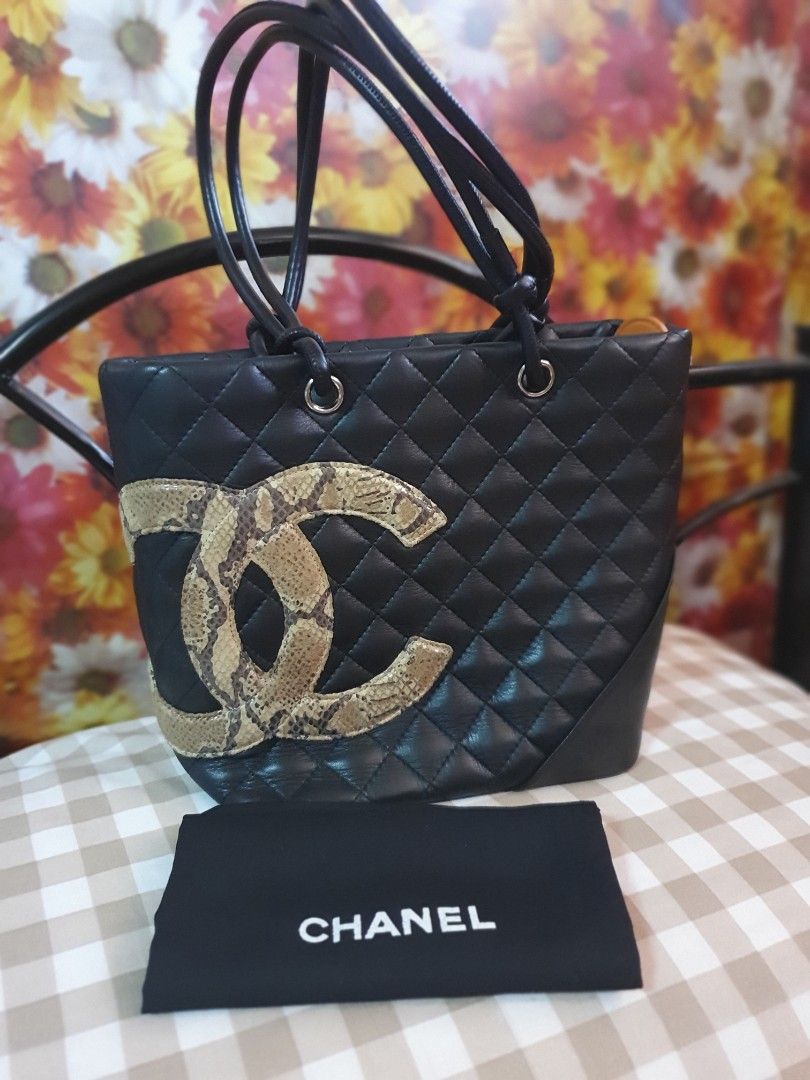 Chanel tote bag (Category: Luxury Bags & Wallets) located in Makati City. Submitted by britishheart (Listing ID 1297200198, Image 3). Description: selling my preloved chanel tote bag..japan source genuine leather almost same with orig but selling this low since no serial# and no certificate but it possessed its originality. like new since used only 2x..japan auction..