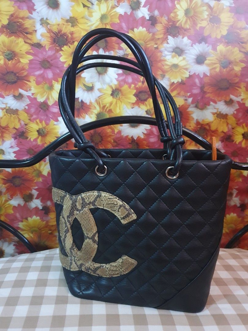 Chanel tote bag (Category: Luxury Bags & Wallets) located in Makati City. Submitted by britishheart (Listing ID 1297200198, Image 1). Description: selling my preloved chanel tote bag..japan source genuine leather almost same with orig but selling this low since no serial# and no certificate but it possessed its originality. like new since used only 2x..japan auction..