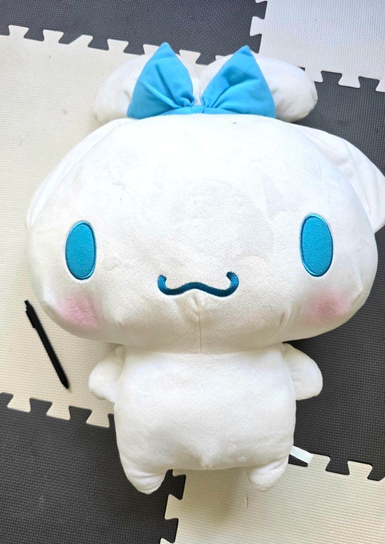 Cinnamaroll BIG sanrio original (Category: Plushies & Soft Toys) located in Paranaque City. Submitted by skyelinemanila (Listing ID 1295431228, Image 1). Description: Cinnamaroll big stuff toy sanrio original bought in Japan! like new!! for lalamove only or pick up at home. very big! pen for size comparison sf shouldered by buyer.