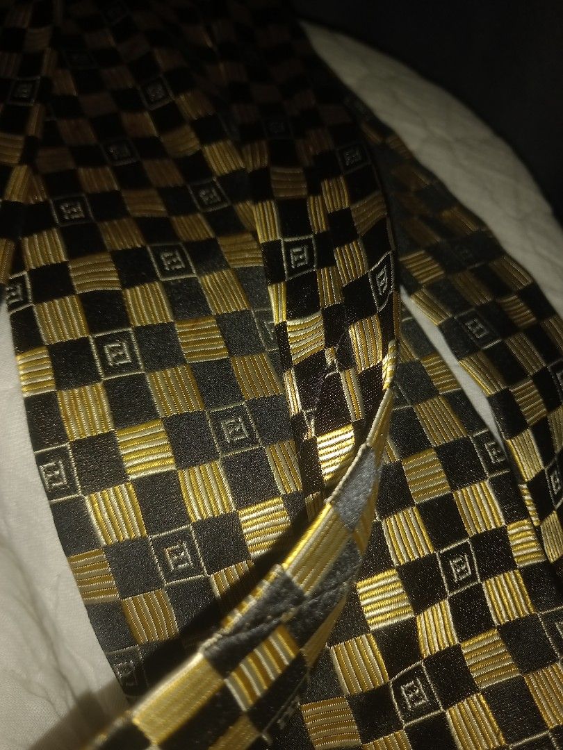 Fendî Necktie (Category: Luxury Bags & Wallets) located in Tuguegarao City. Submitted by preloved_japan_items (Listing ID 1297209679, Image 2). Description: fendi necktie for men with minimal stain.