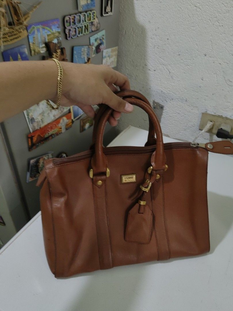 GIANFRANCO FERRE (Category: Luxury Bags & Wallets) located in Davao. Submitted by daneyvintage (Listing ID 1297155977, Image 1). Description: genuine leather.