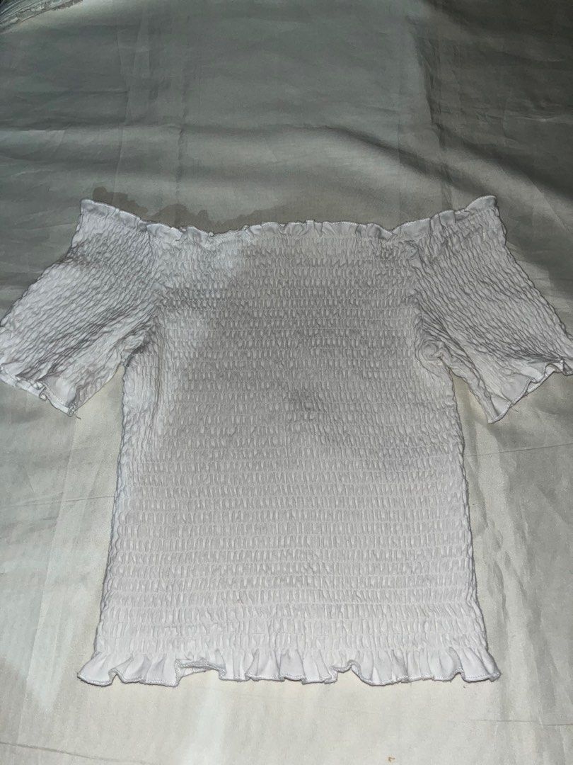 H&M White Off Shoulder Smocked Top, Size S (Category: Blouses) located in Quezon City. Submitted by MGcollection (Listing ID 1297206395, Image 2). Description: No issue or flaws, fits Small to Medium Stretchable.