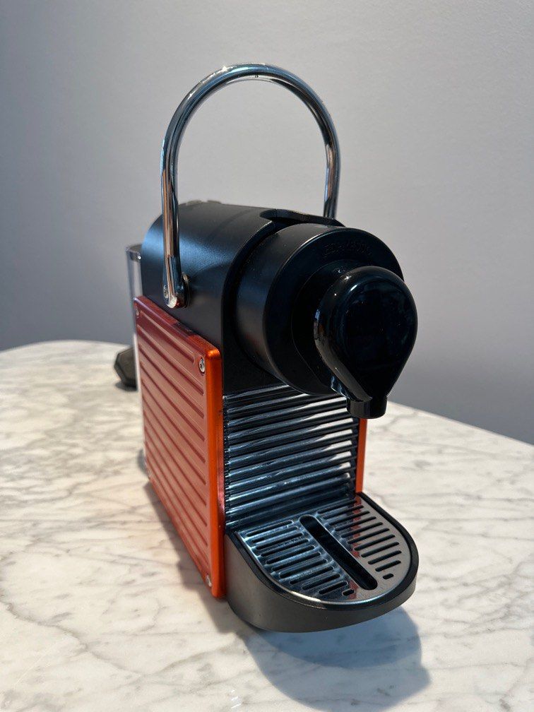 Nespresso Pixie Red (Category: Coffee Machines & Makers) located in Singapore. Submitted by police.case (Listing ID 1297159763, Image 1). Description: Bought in 2021, lightly used and still in excellent condition as it is very well maintained. couple of scratches here and there as u can see in the pictures but it’s due to natural wear and tear from usage. changing cos moved to new house, and got another Nespresso machine as gift. Able to use with