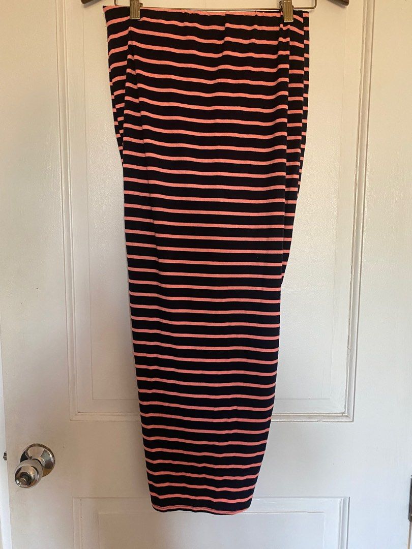 Striped Skirt (Category: Skirts) located in Paranaque City. Submitted by yard_army (Listing ID 1297138972, Image 3). Description: Imported Skirt Striped pink and dark blue 34” in length Nice fit Front slit-like detail, nice when worn 28” waist when laid flat. garterized. No stain, no damage..