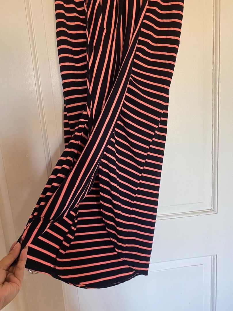 Striped Skirt (Category: Skirts) located in Paranaque City. Submitted by yard_army (Listing ID 1297138972, Image 2). Description: Imported Skirt Striped pink and dark blue 34” in length Nice fit Front slit-like detail, nice when worn 28” waist when laid flat. garterized. No stain, no damage..