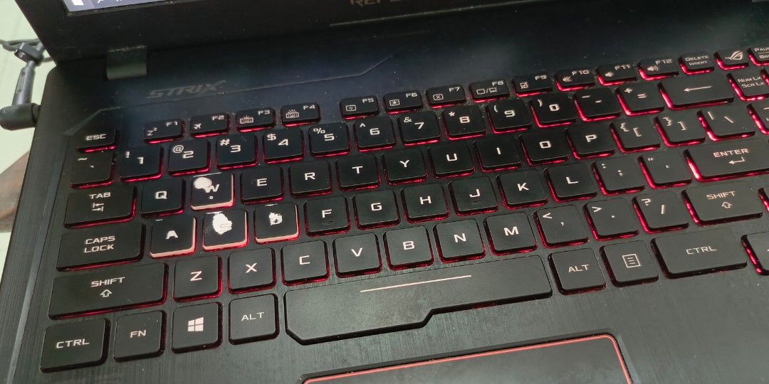 Asus ROG strix GL553VE (Category: Laptops & Notebooks) located in Manila. Submitted by ronzky19 (Listing ID 1297270965, Image 2). Description: RUSH working condition Asus Rog Strix Intel 7 GTX 1050Ti 256 ssd plus 1 TB HDD, windows 10 DDR5 with meet up Paco. manila issue only faded keyboard letters battery needs to be replaced.
