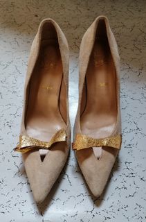 Christian L. beige high heel shoes