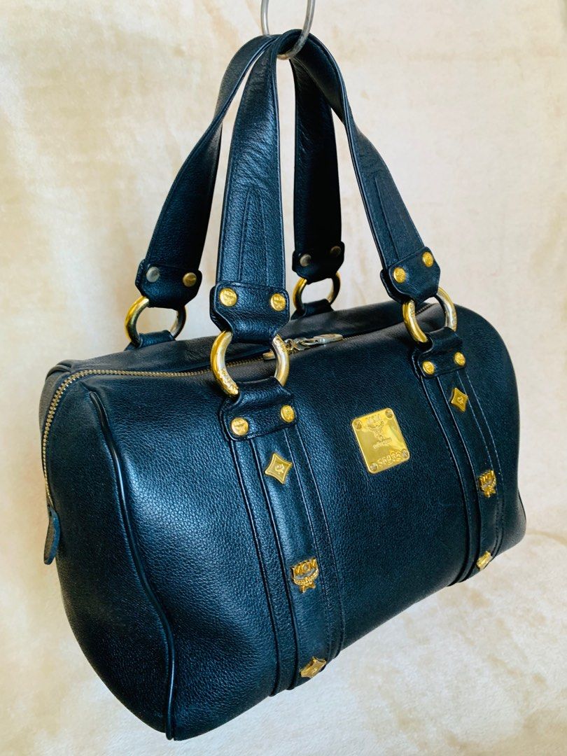 MCM Large Boston Bag (Category: Luxury Bags & Wallets) located in Cavite. Submitted by belle.envie (Listing ID 1297333720, Image 2). Description: ✔︎Original MCM Germany Large Doctors Bag ✔︎No Flaws ✔︎Good as New ✔︎Hardwares still Gold ✔︎Super Clean inside Out ✔︎Size: 11 x 9 x 7 inches ✔︎No rubs - No Cracks - No scuffs MOP : Gcash and BDO SHIPPING : LALAMOVE for Cavite nearby places, J&T , LBC COP .