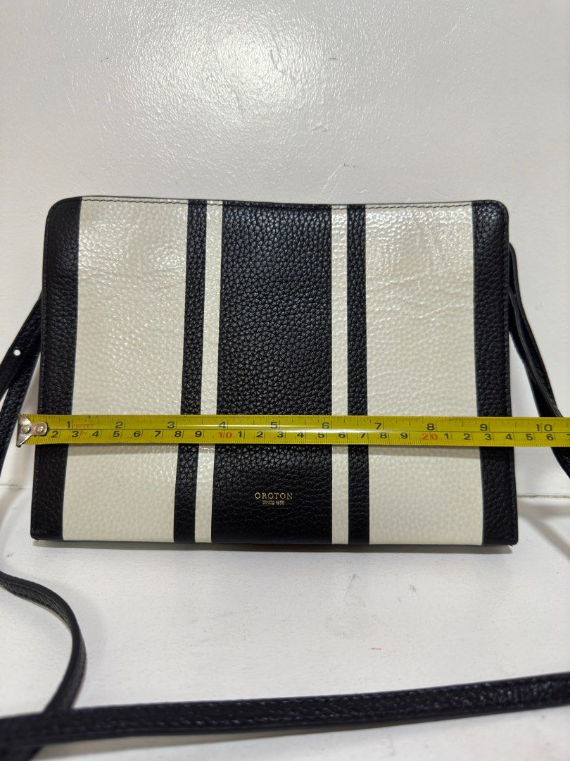 Oroton Striped Leather Crossbody Bag (Category: Luxury Bags & Wallets) located in Pasig City. Submitted by armoire_deluxe (Listing ID 1297376894, Image 3). Description: Pre💕 item. In good condition..