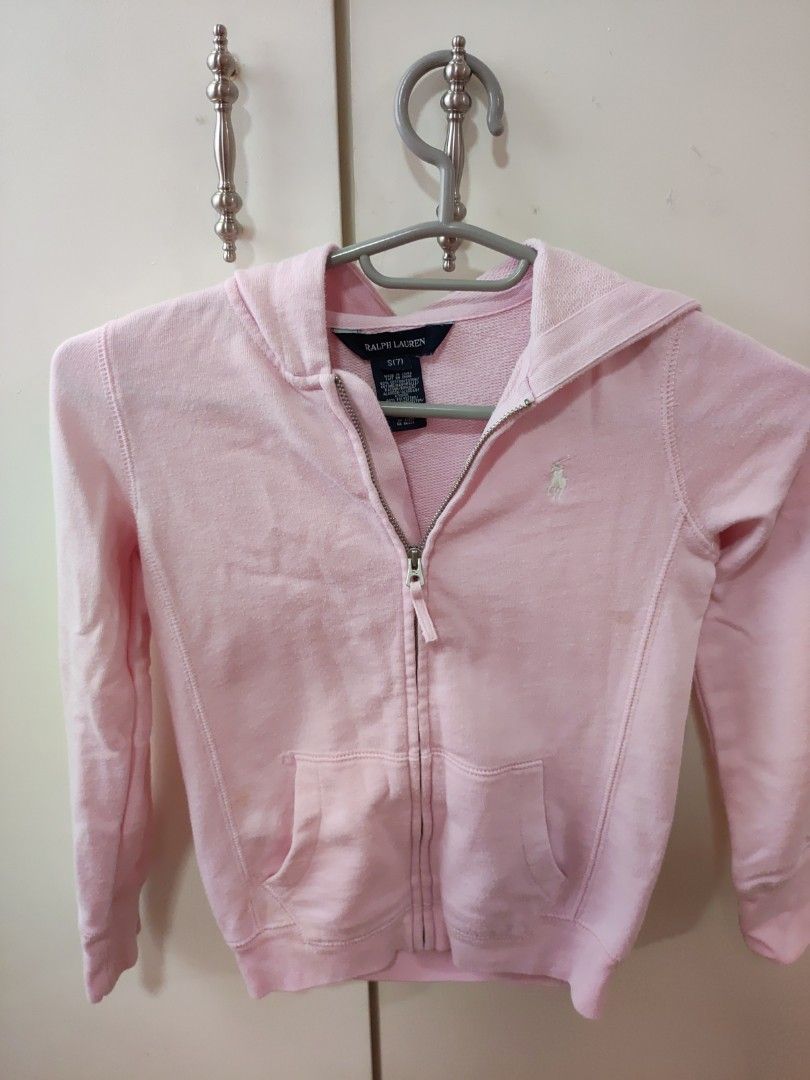 Ralph Lauren pink Hoodie (Category: Babies & Kids Fashion) located in Makati City. Submitted by stargazer2016 (Listing ID 1297257923, Image 1). Description: Cotton, polyester. Machine washable. Size medium has a 20¼" body length (front and back) and a 26" sleeve length. Sleeve length is taken from the center back of the neck. Signature embroidered Pony at the left chest. Hood. Full-zip front. Long sleeves with ribbed cuffs. Split kangaroo pocket.
