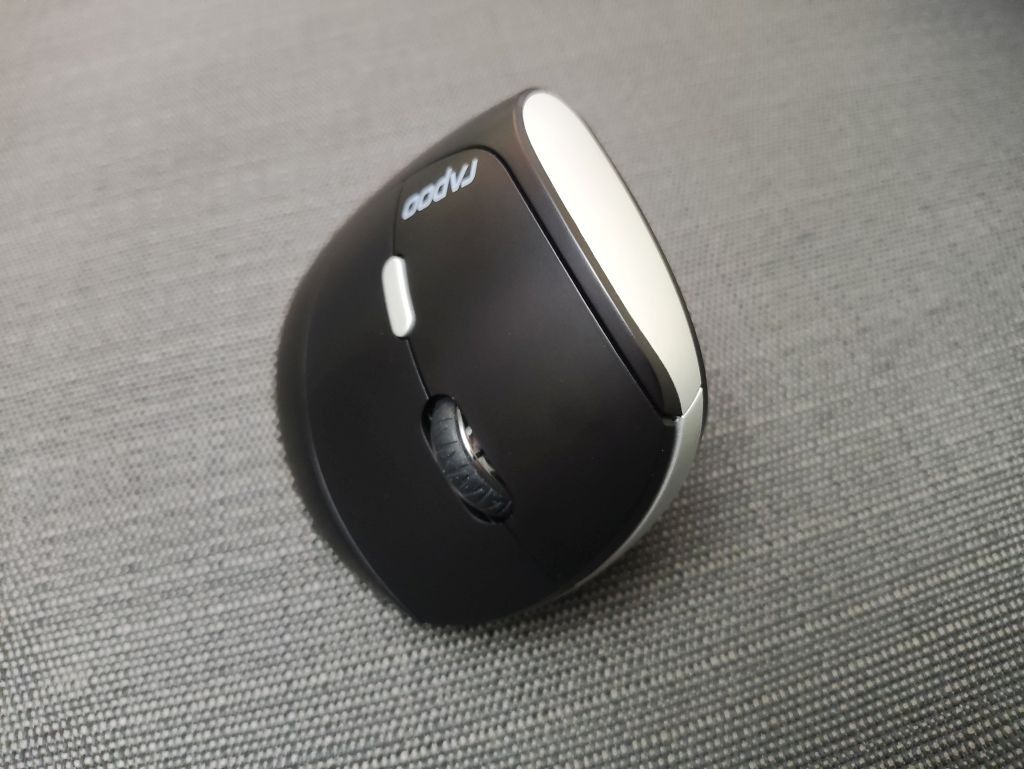 Rapoo EV250 Wireless Optical Vertical Mouse (Category: Mouse & Mousepads) located in Manila. Submitted by gracedyf (Listing ID 1297255218, Image 3). Description: Rapoo EV250 Wireless Optical Vertical Mouse • Brand new with box (opened box for testing and picture taking) • Rapoo Vertical Mouse • Vertical ergonomic design • Reliable 2.4 GHz wireless connection • High-resolution Adjustable 1600 DPI sensor • Silent Click Mouse • Wireless Optical Mous