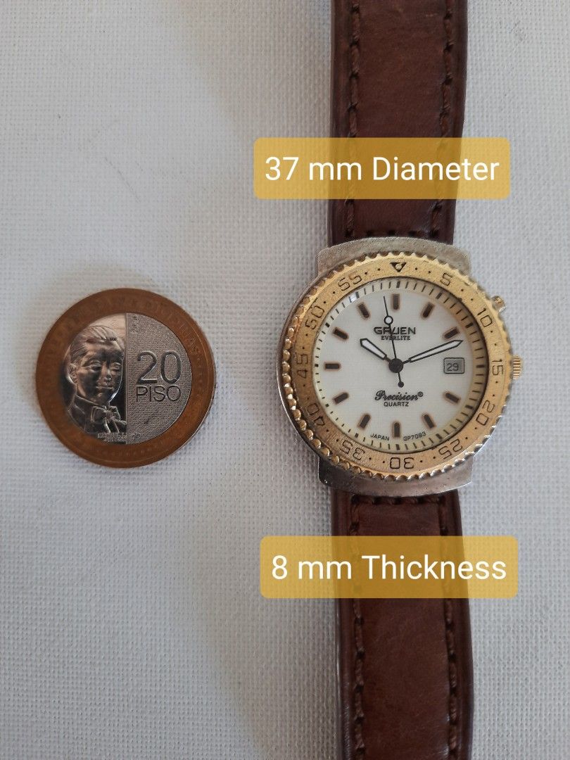 Vintage GRUEN Everlite Precision Quartz for Men (Category: Men's Watches) located in Manila. Submitted by expat_collections (Listing ID 1297296051, Image 3). Description: ☆ Vintage Gruen Everlite Precision Watch 219610 is a rare find ☆ Weight is 50 grams and very light to wear ☆ 37mm Diameter and 8mm Thickness ☆ Made of stainless steel material back/base steel bezel and gold plated face ☆ Analog white dial, H, M, S ☆ Date at 3 o'clock position ☆ 
