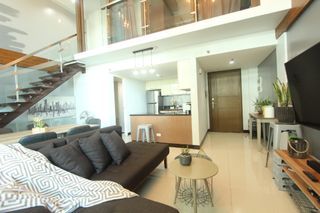Industrial 1 bedroom loft with balcony for rent at Eastwood Legrand 2