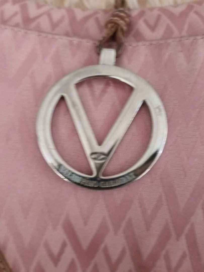 Authentic pink Valentino Garavani bag (Category: Luxury Bags & Wallets) located in Quezon City. Submitted by cncarousel (Listing ID 1297484499, Image 3). Description: 💯 Authentic not used just kept with dust bag card.