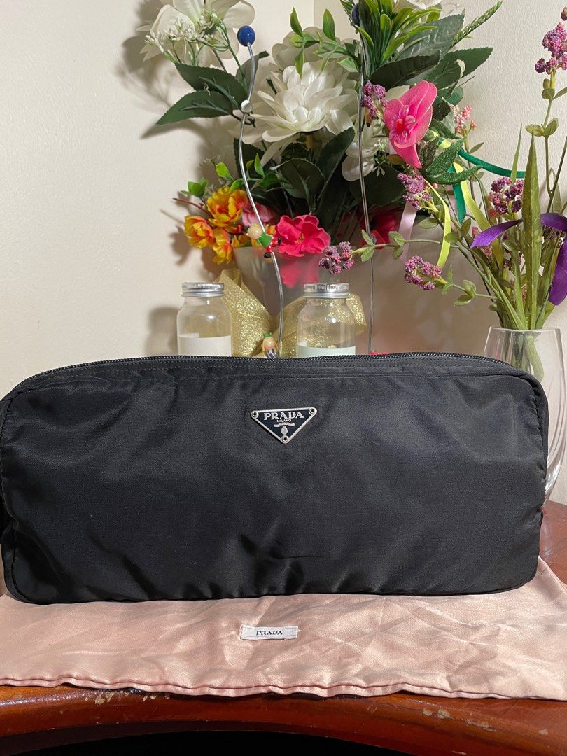 Authentic💯 Prada Nylon Cosmetic Pouch Black (Category: Luxury Bags & Wallets) located in Tagum. Submitted by maryjanepradalux (Listing ID 1297491291, Image 2). Description: No inclusion No issue 💯Authentic Money back guarantee if proven fake Pm for more details😍😍😍.