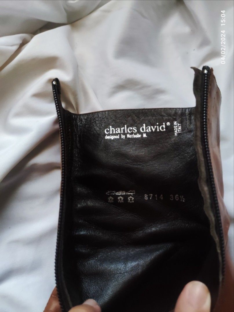 CHARLES DAVID BOOTS (MADE IN ITALY) (Category: Boots) located in Rizal. Submitted by browk.ph (Listing ID 1297421199, Image 3). Description: Feel free to make an offer 🙂 Major decluttering Size: 6.5 women's Flaws: Signs of usage. One noticeable flaw on the last pic but can be fixed easily. Check their website to see the prices of their boots: https://charlesdavid.com/collections/boots.