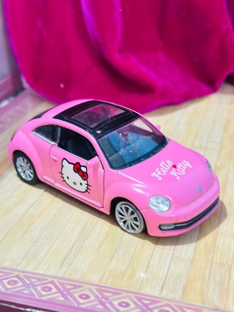 Hello Kitty Volkswagen the Beetle Diecast (Category: Vehicle & Diecast Models) located in General Santos City (Dadiangas). Submitted by toysville888 (Listing ID 1297405271, Image 2). Description: Original Hello Kitty Volkswagen the Beetle by Welly diecast 1/38 scale flaw: some scratches and dust inside the car. natanggal ang isang rubber tire infront overall, presentable pa naman.bawal po sa maarte. nice padin pang display addl 100sf location: Ge