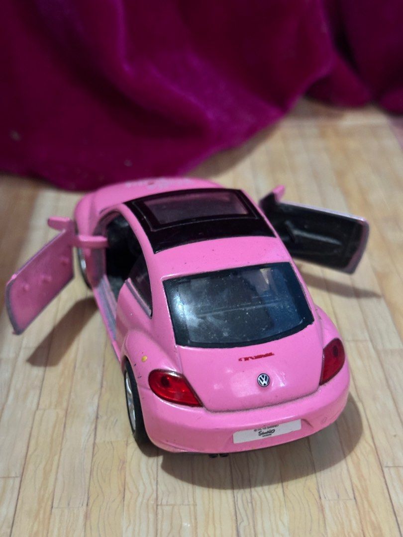 Hello Kitty Volkswagen the Beetle Diecast (Category: Vehicle & Diecast Models) located in General Santos City (Dadiangas). Submitted by toysville888 (Listing ID 1297405271, Image 3). Description: Original Hello Kitty Volkswagen the Beetle by Welly diecast 1/38 scale flaw: some scratches and dust inside the car. natanggal ang isang rubber tire infront overall, presentable pa naman.bawal po sa maarte. nice padin pang display addl 100sf location: Ge