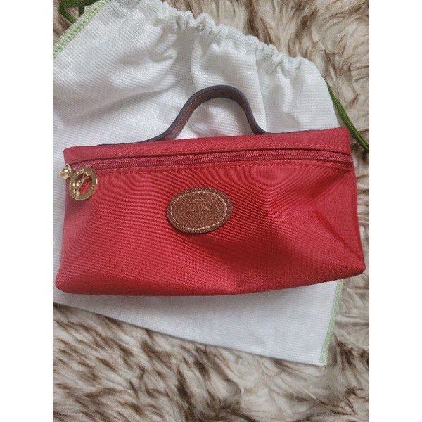 Longchamp Le Pliage Cosmetic Pouch/Case (Category: Purses & Pouches) located in Taguig. Submitted by shopaholic.ai (Listing ID 1297428923, Image 3). Description: 📌Actual pictures posted. Condition: Brand New. No Box. Size: 19x10x6cm ( there may be a minimal difference in the manual measure) Color: As shown in the images (slight difference in the actual due to lighting exposure) Inclusio: Dustbag and Booklet 📣1-2 days shipping preparation 📑IMPO