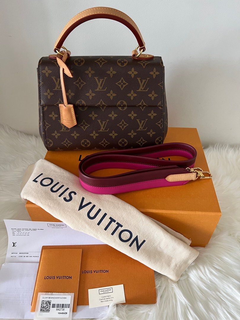 LV CLUNY BB 💯 Authentic (Category: Luxury Bags & Wallets) located in Manila. Submitted by ehnong (Listing ID 1297465022, Image 2). Description: LV Cluny Monogram BB Interior and Strap (Pink) 💯 Authentic **bought directly from the LV store in Paris Casual and neutral handbag. It’s beautifully structured, and can be worn in multiple ways: cross-body, shoulder bag, and handheld. INCLUSION: Complete - with LV Box, Paper bag, Dust bag, Clochette, Bo