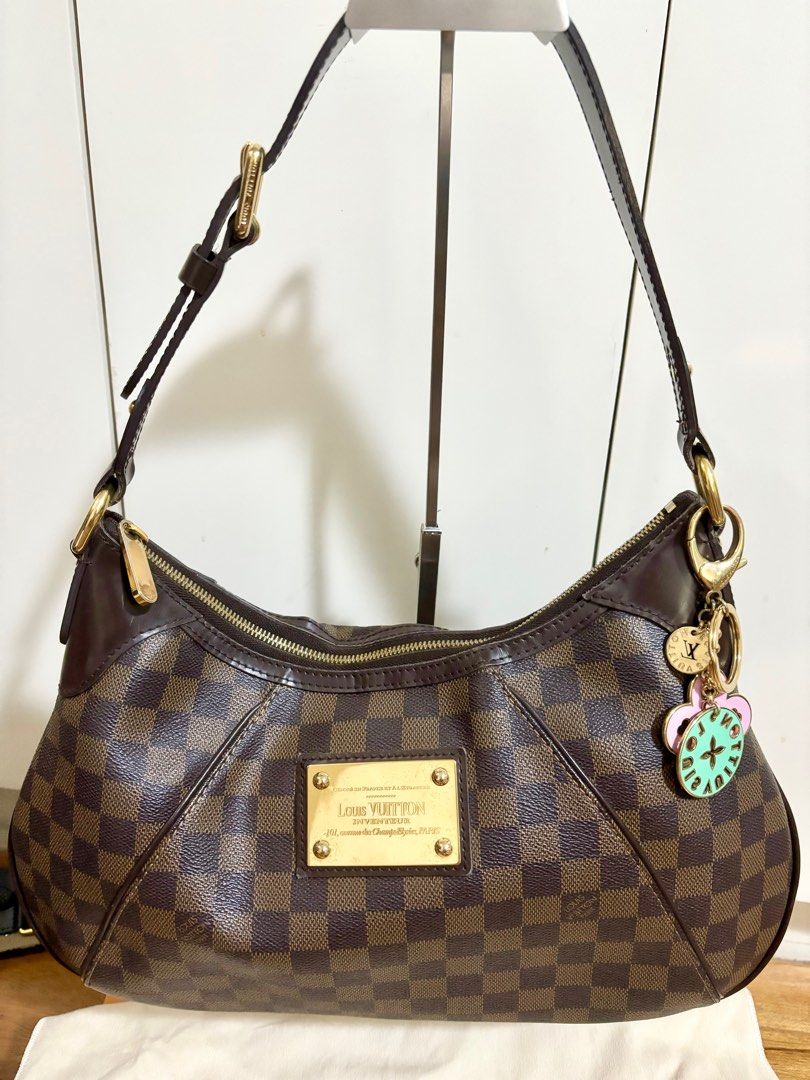 LV Thames MM (Category: Luxury Bags & Wallets) located in Cebu City. Submitted by stuffforyouph (Listing ID 1297529316, Image 2). Description: Item: lv thames damier ebene Color: damier ebene Size: medium Inclusions: dustbag (bagcharm not included) Price: P44K Condition: 8.5/10 light scratches on hardware .