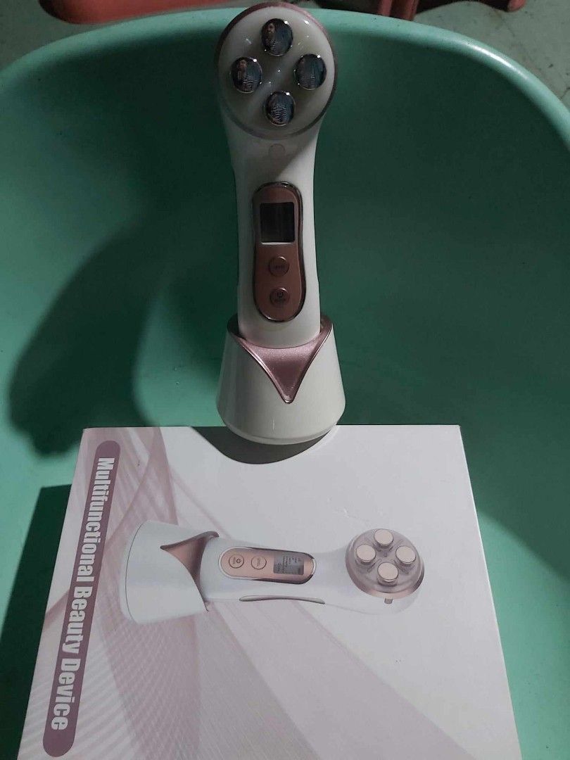 Multifunctional Beauty Device (Category: Face Care) located in Quezon City. Submitted by rolenalma (Listing ID 1297494956, Image 2). Description: Multi functional beauty device face massager, skin care device, lifting, thighten, wrinkle removal. In good condition as new. M. O. D - lalamove, j&t, lbc M. O. P - gcash..