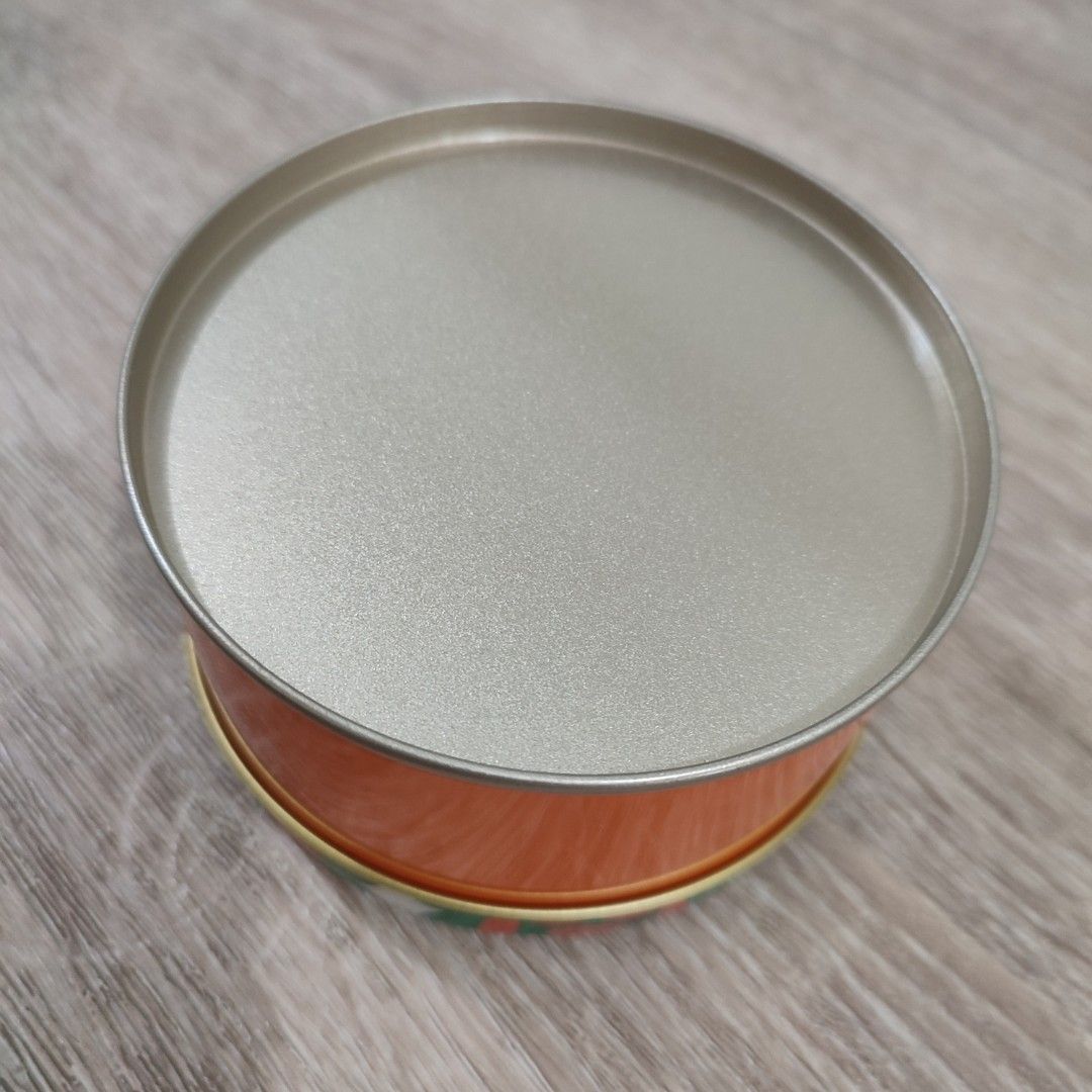Orange Round Tin Can with Print and Design Storage Box (Category: Storage Boxes & Baskets) located in Manila. Submitted by trainy (Listing ID 1297396298, Image 2). Description: Color: Orange Shape: Round With Printed Design and Text: Yes Size: 9.5 x 9.5 x 5.3 cm Classic and Elegant Food-grade Tin Can.