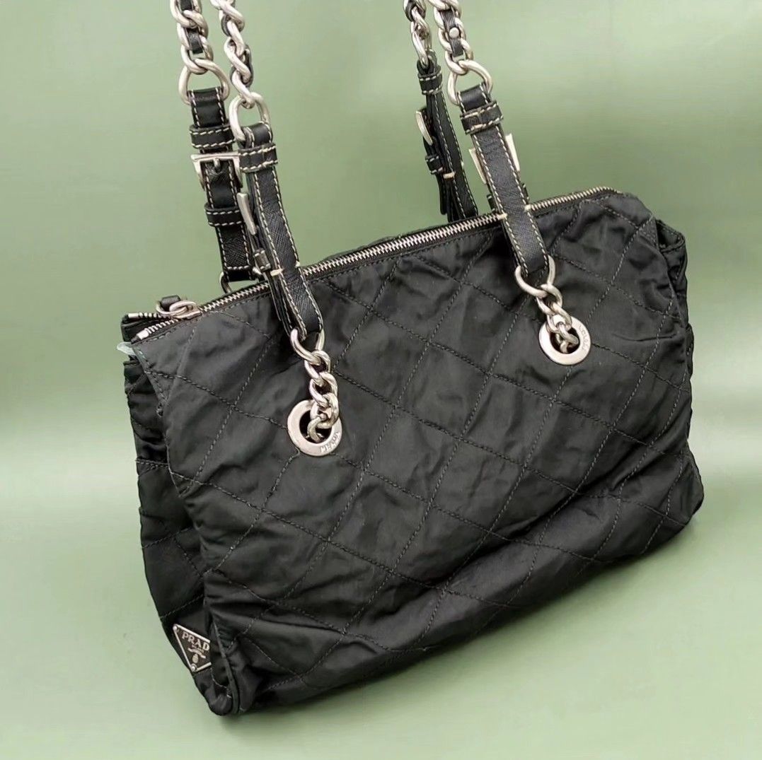 PRADA black chain, tessuto and leather bag (Category: Luxury Bags & Wallets) located in Quezon City. Submitted by rmseller.2017 (Listing ID 1297470049, Image 1). Description: PRADA black chain, tessuto and leather bag | excellent condition | comes with generic dustbag | P13,500 only (open for installment).