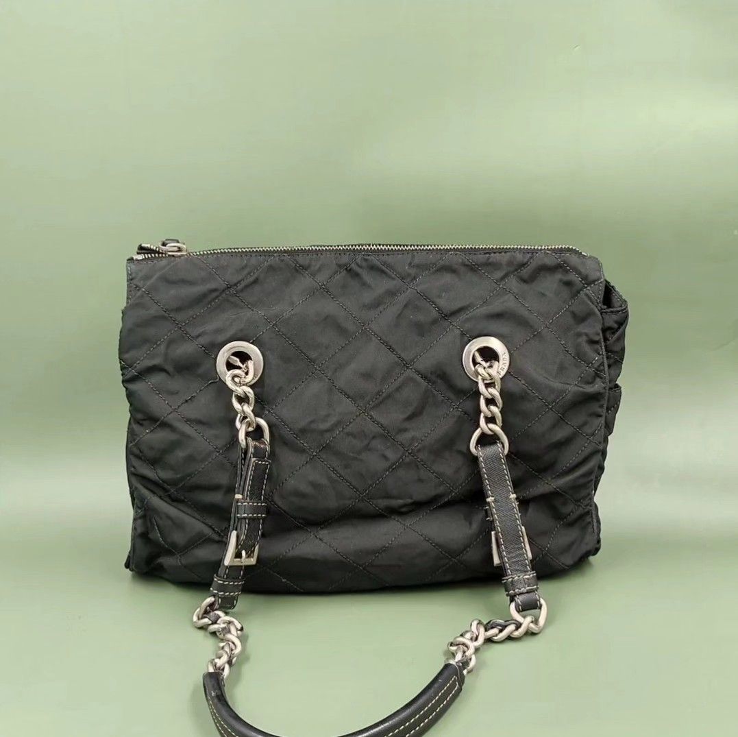 PRADA black chain, tessuto and leather bag (Category: Luxury Bags & Wallets) located in Quezon City. Submitted by rmseller.2017 (Listing ID 1297470049, Image 2). Description: PRADA black chain, tessuto and leather bag | excellent condition | comes with generic dustbag | P13,500 only (open for installment).