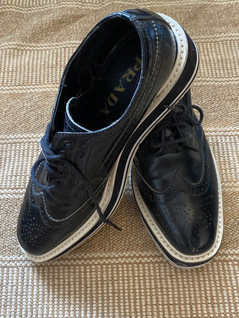 Prada Genuine Leather Platform Derby Oxford Wingtip Size 36 (Category: Loafers) located in Quezon City. Submitted by koalaaa_ (Listing ID 1297430700, Image 2). Description: Prada Black Genuine Leather Platform Derby Oxfords Wingtip Size 36. Also fits Size 35. Still in excellent condition MOP: BPI, GCash .