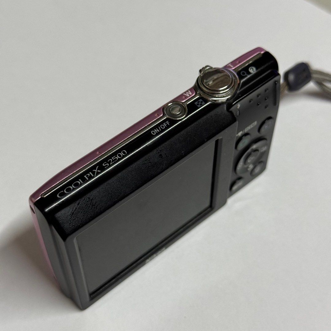 RARE Nikon Coolpix S2500 Pink Digital Camera (Category: Cameras) located in Manila. Submitted by doremicarteu (Listing ID 1297462733, Image 2). Description: kindly contact me via sms ! im currently on msg quota :( ꒰ RARE nikon coolpix s2500 ꒱ ⤷ fully functional ⤷ vintage output (8/10 cosmetics) ⤷ cute pink color 😩💗 ⤷ inclus : cam, battery, universal charger, wrist strap ⤷ issue : yellow excess light and some dots (doesn’t affect the output) dm 