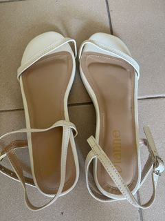 White flat sandals