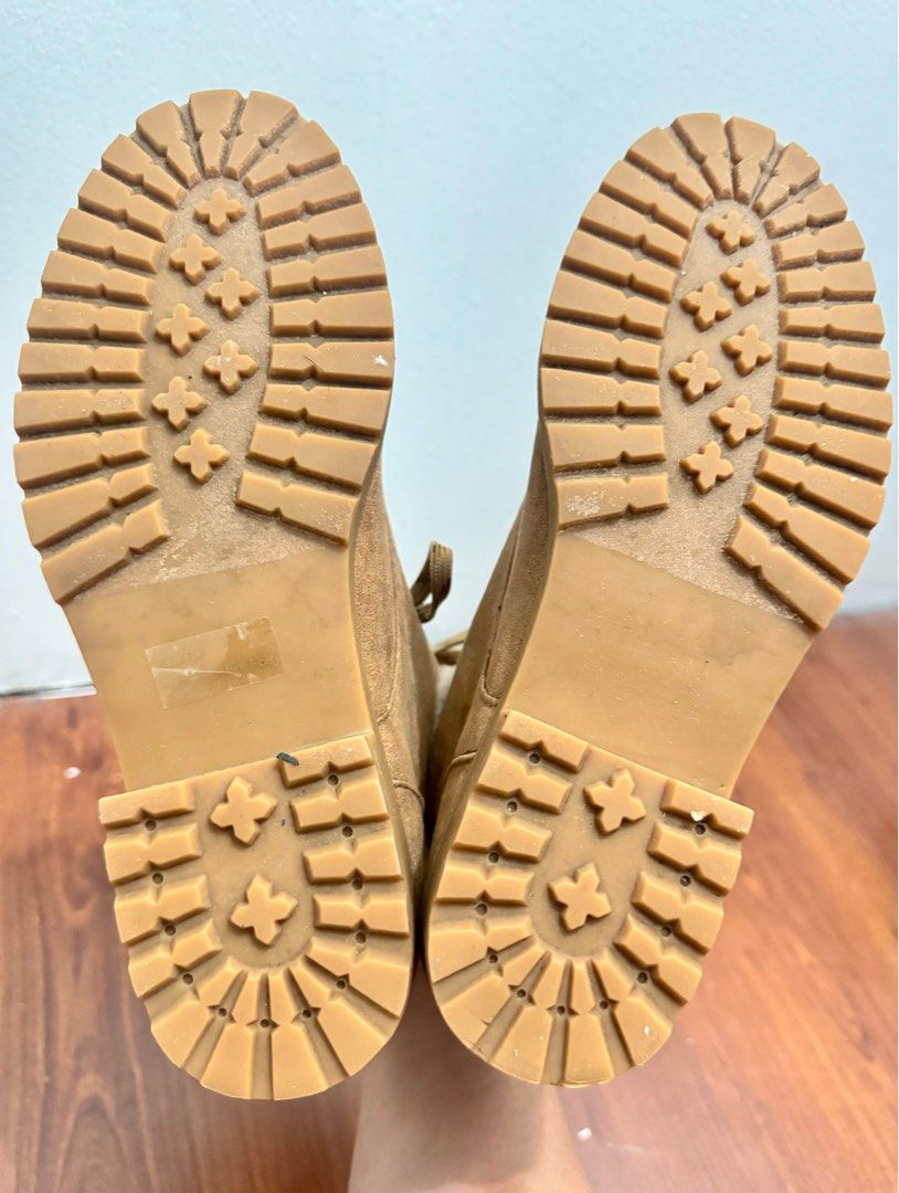 Winter Boots (Category: Boots) located in Manila. Submitted by fashcashbabe (Listing ID 1297518707, Image 3). Description: Height: Mid-calf Color: Camel Light weight and very nice when worn Stain on left boot as shown in picture number 4 and some horizontal marks .