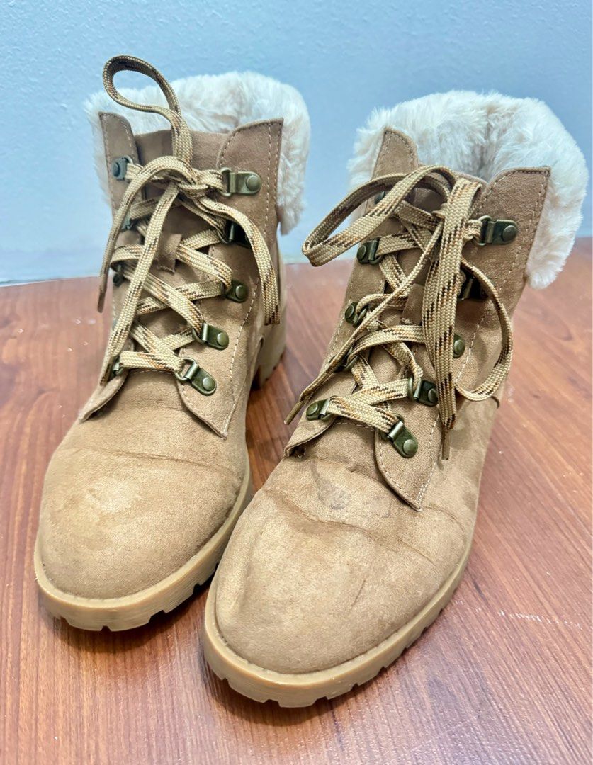 Winter Boots (Category: Boots) located in Manila. Submitted by fashcashbabe (Listing ID 1297518707, Image 2). Description: Height: Mid-calf Color: Camel Light weight and very nice when worn Stain on left boot as shown in picture number 4 and some horizontal marks .