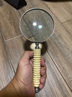[19]	vintage magnifying glass
