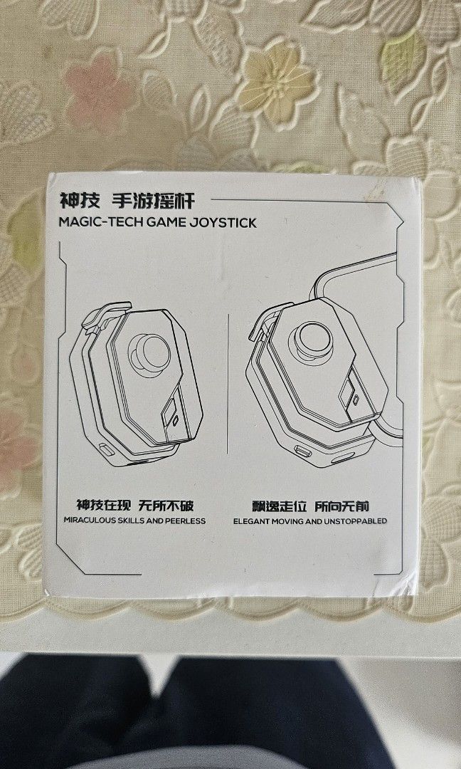 Bluetooth Gaming Controller (Category: Controllers) located in Singapore. Submitted by kaxdd (Listing ID 1301056397, Image 2). Description: Selling a Bluetooth gaming controller. Received it as a gift. Unused, brand new. Instruction manual and charging connection cable included. Self collect at my Pasir Ris residence..