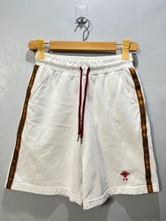 Christian Dior shorts (with side tape and embroidered bee)
